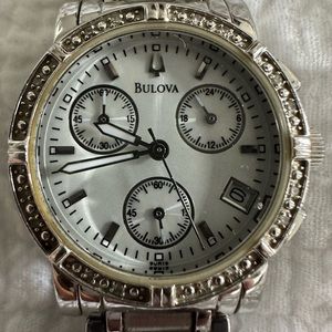 Bulova diamond face watch.